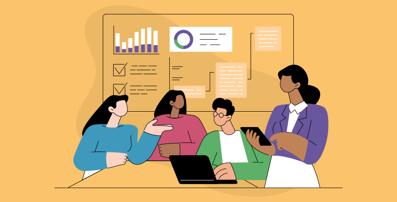 Equipe reunida analisando informações, gráficos e tarefas em painel.