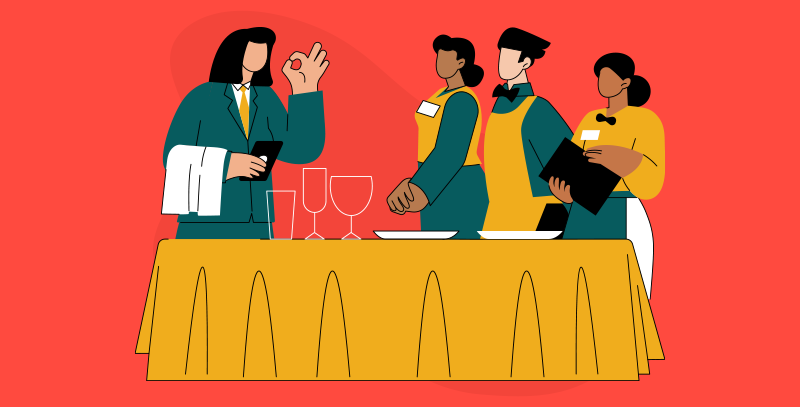 Cena de gerente de bar com equipe de atendimento ao redor de mesa, com copos e itens de serviço.